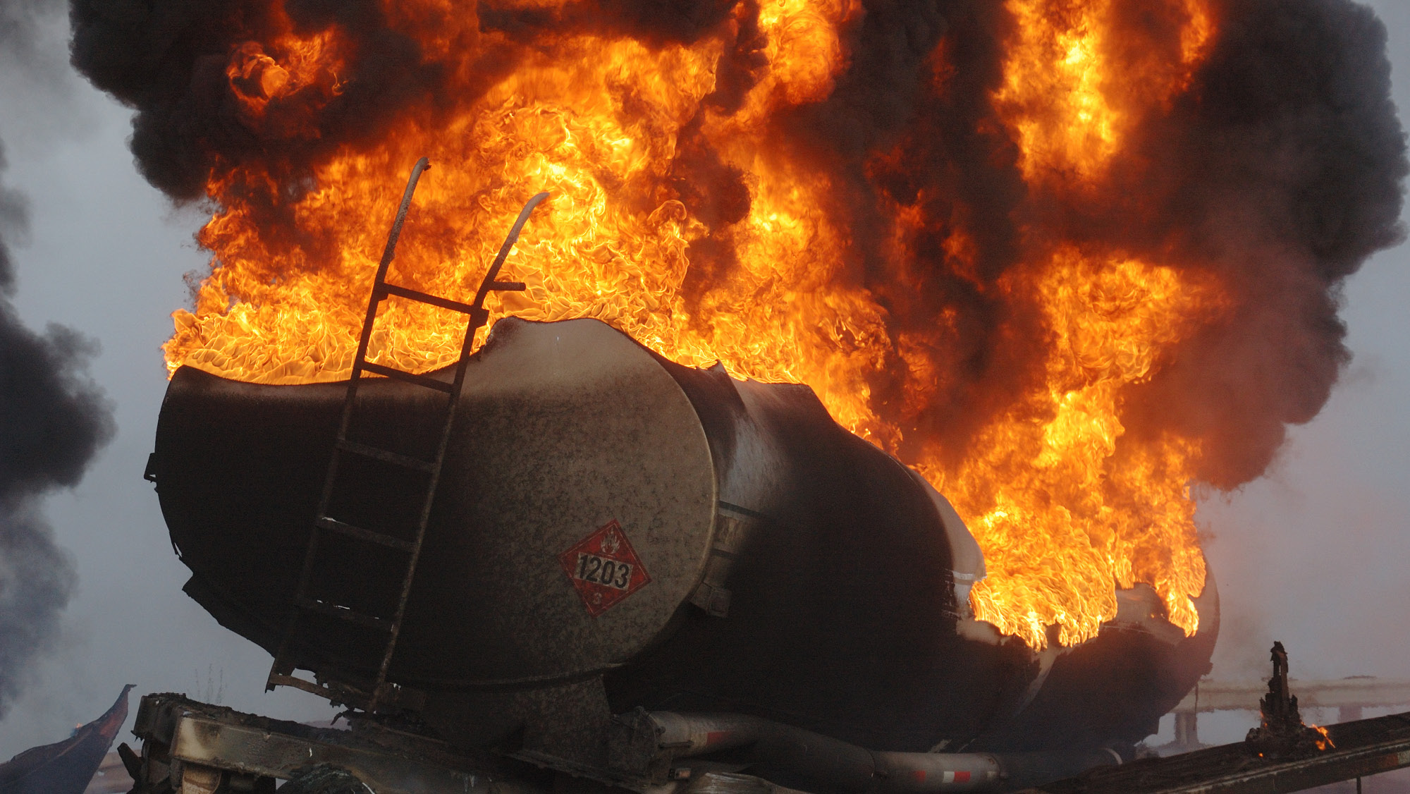 Destroyed fuel tank trailer on fire